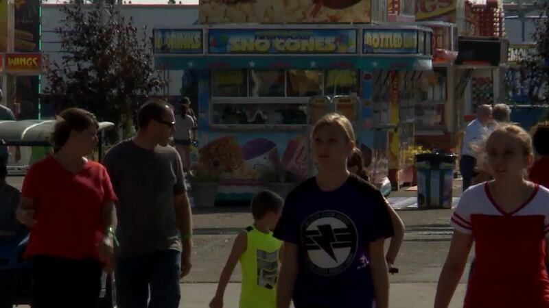 People walk the Fair grounds in its 150th year.