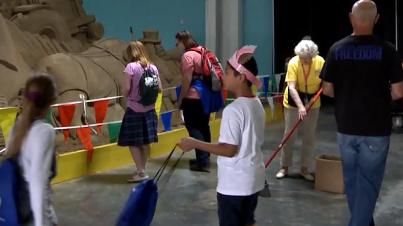 Volunteer works at the Nebraska State Fair.