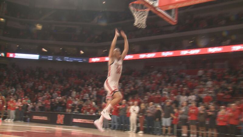 Keisei Tominaga jumps up toward the hoop prior to Nebraska's game against Rider.