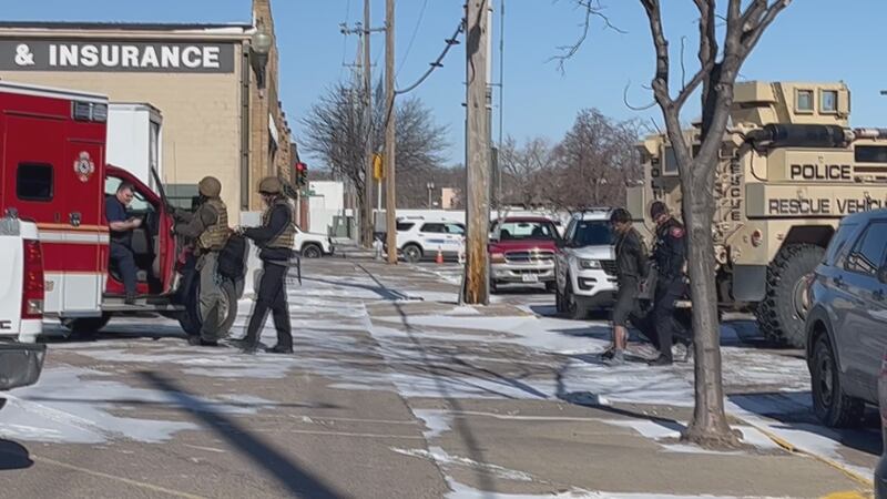 Police taking a man into custody after GIPD said he barricaded himself into St. Stephen's...