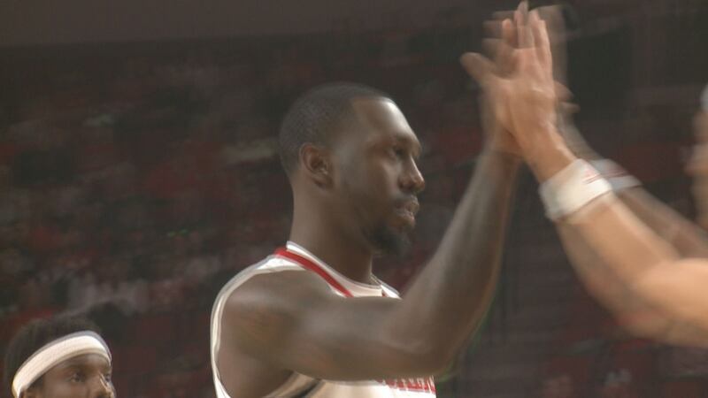 Nebraska forward Juwan Gary gives a teammate a high five during the Huskers' win over Stony...