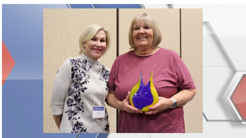Donna Martin, a Montessori teacher from Omaha, right, was recognized with the Early Childhood...
