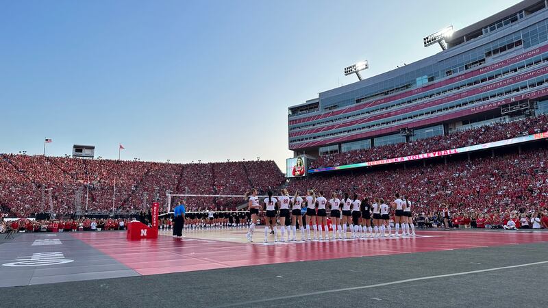 Nebraska's starting lineup is introduced before the match during Volleyball Day in Nebraska at...
