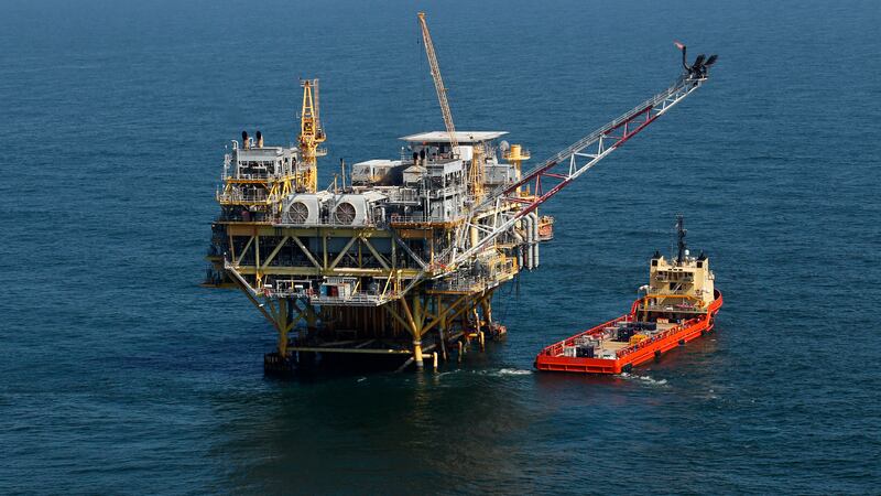 FILE - A rig and supply vessel are pictured in the Gulf of Mexico off the cost of Louisiana,...