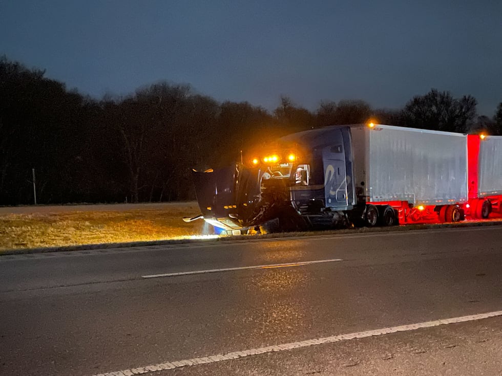 A semi sits in the median of I-80 in western Lancaster County after a head-on crash with a car...