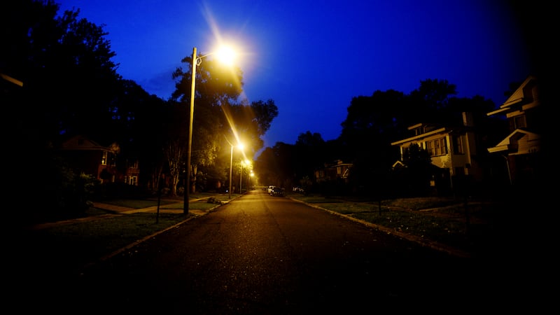 Forrest Avenue, in the South Highland neighborhood, is dark except for streetlights in the...