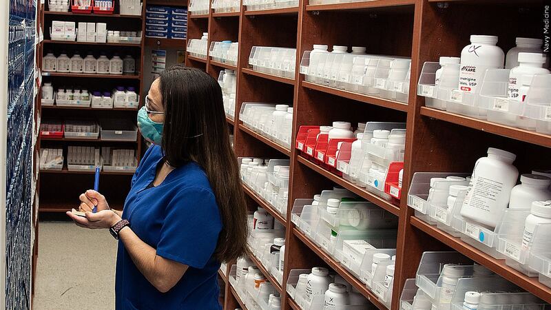 FILE: A pharmacist walks through prescriptions. FDA data shows liquid amoxicillin is still in...